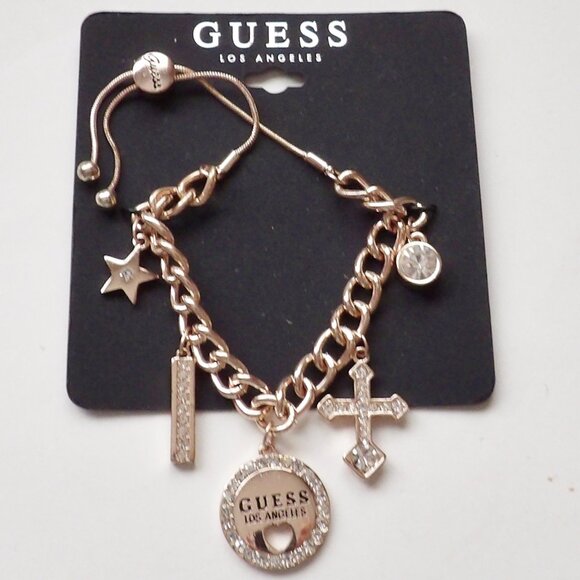 Guess Rose Gold colored Charm Bracelet Adjustable Cross Circle Pendant Star NWT - Picture 1 of 5